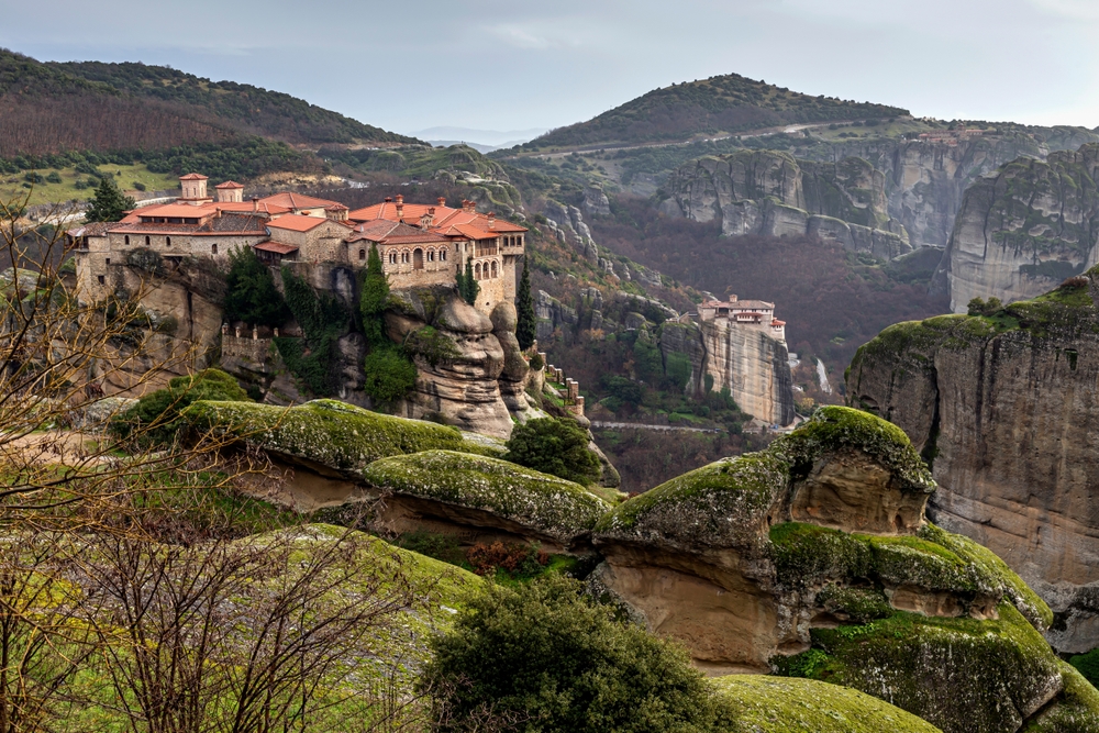 Mysteries and Myths: Uncovering the Legends of Meteora: The cliffs on which the monasteries are located and the view of the Thessaly plain (Thessaly, Greece,Trikala). 