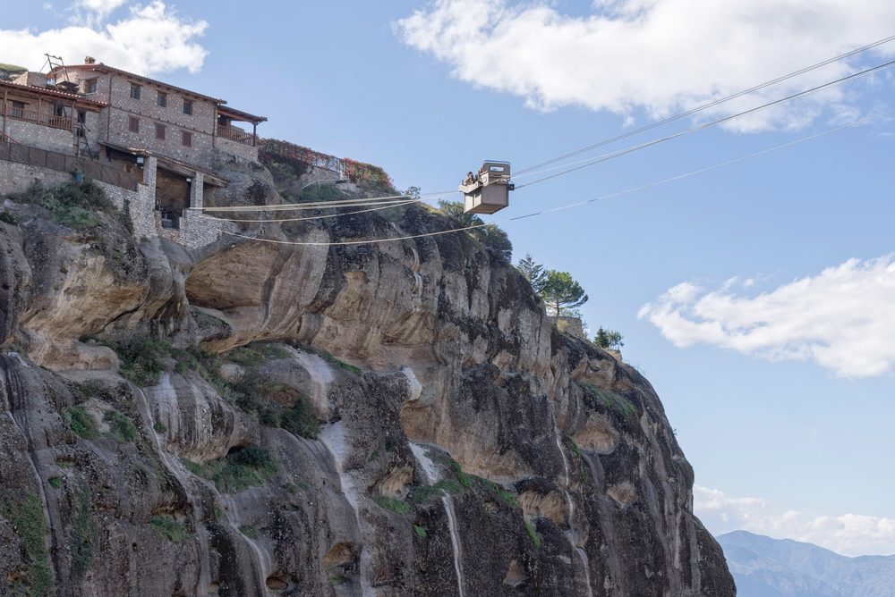 Holy Monastery of the Transfiguration of Christ (Great-Meteoron) on rock with elevator box over abyss. Meteora, Thessaly, Greece. 